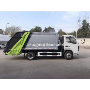 Camion compacteur d&#39;ordures avec poussoir arrière